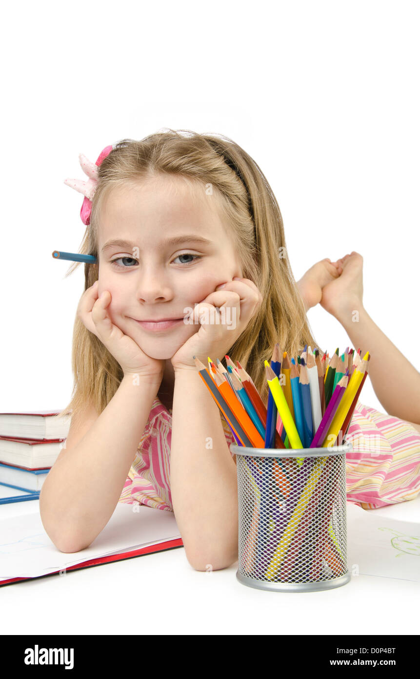 Little girl writing with pencils Stock Photo Alamy