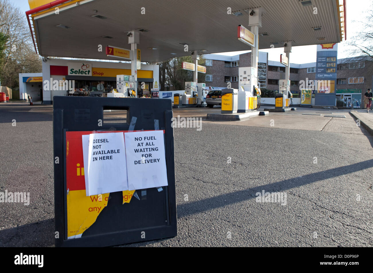 fuel crisis in uk, cars queue for fuel and petrol stations run out of