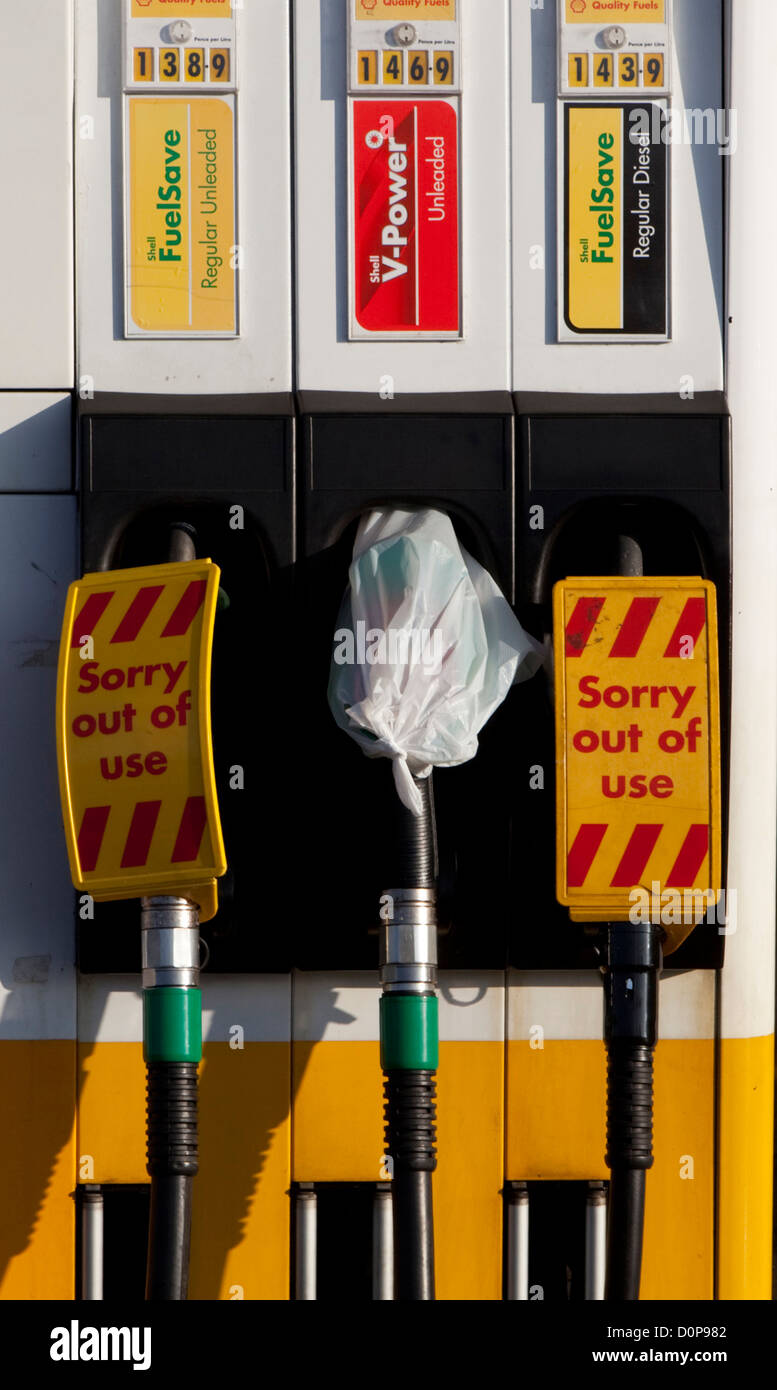 fuel crisis in uk, cars queue for fuel and petrol stations run out of