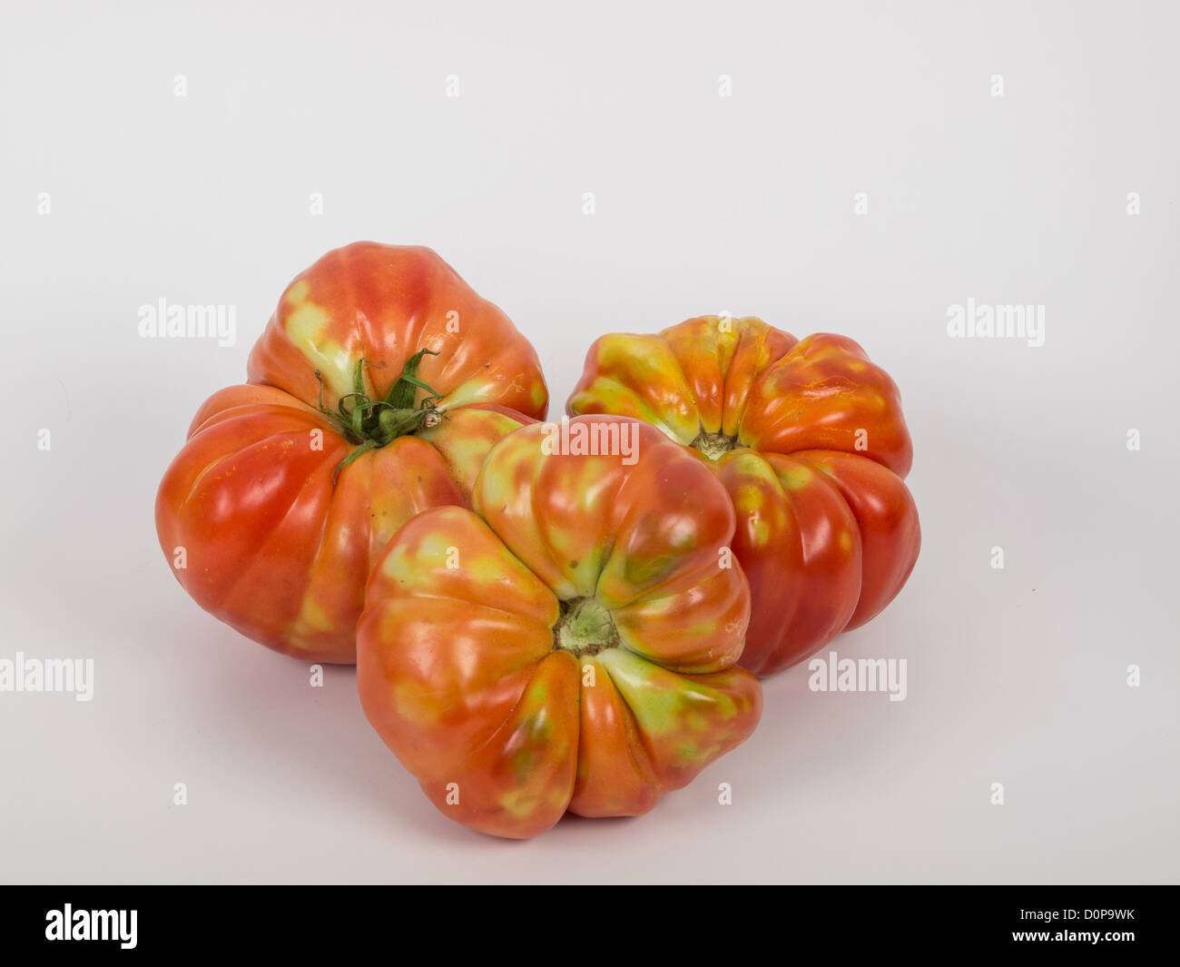 organic tomato isolated on white background Stock Photo - Alamy
