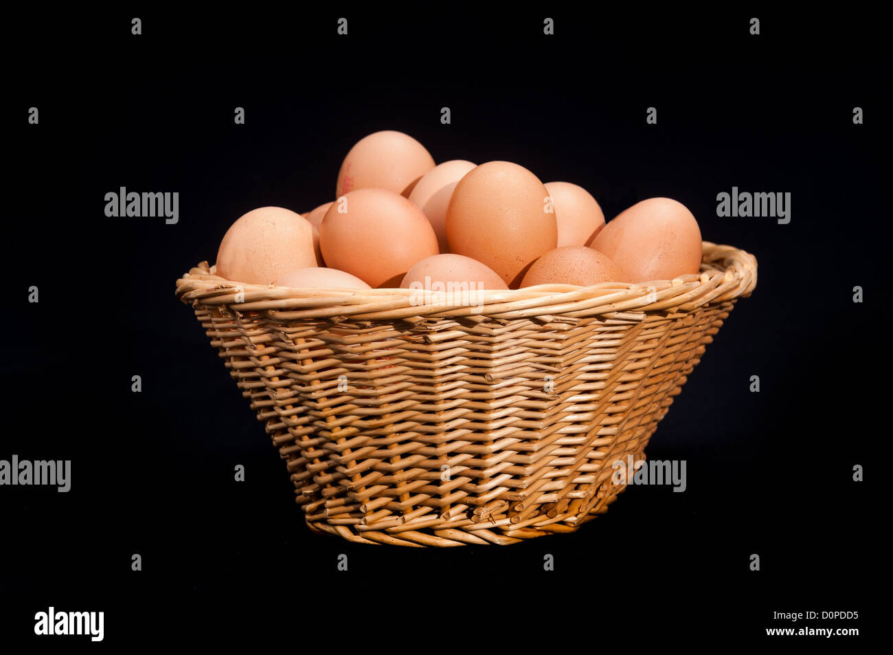 Basket of fresh eggs photographed in the studio Stock Photo