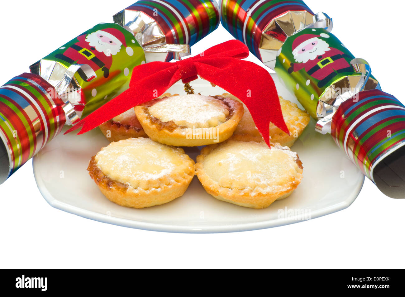 Plate of Mince Pies with Christmas Crackers Stock Photo