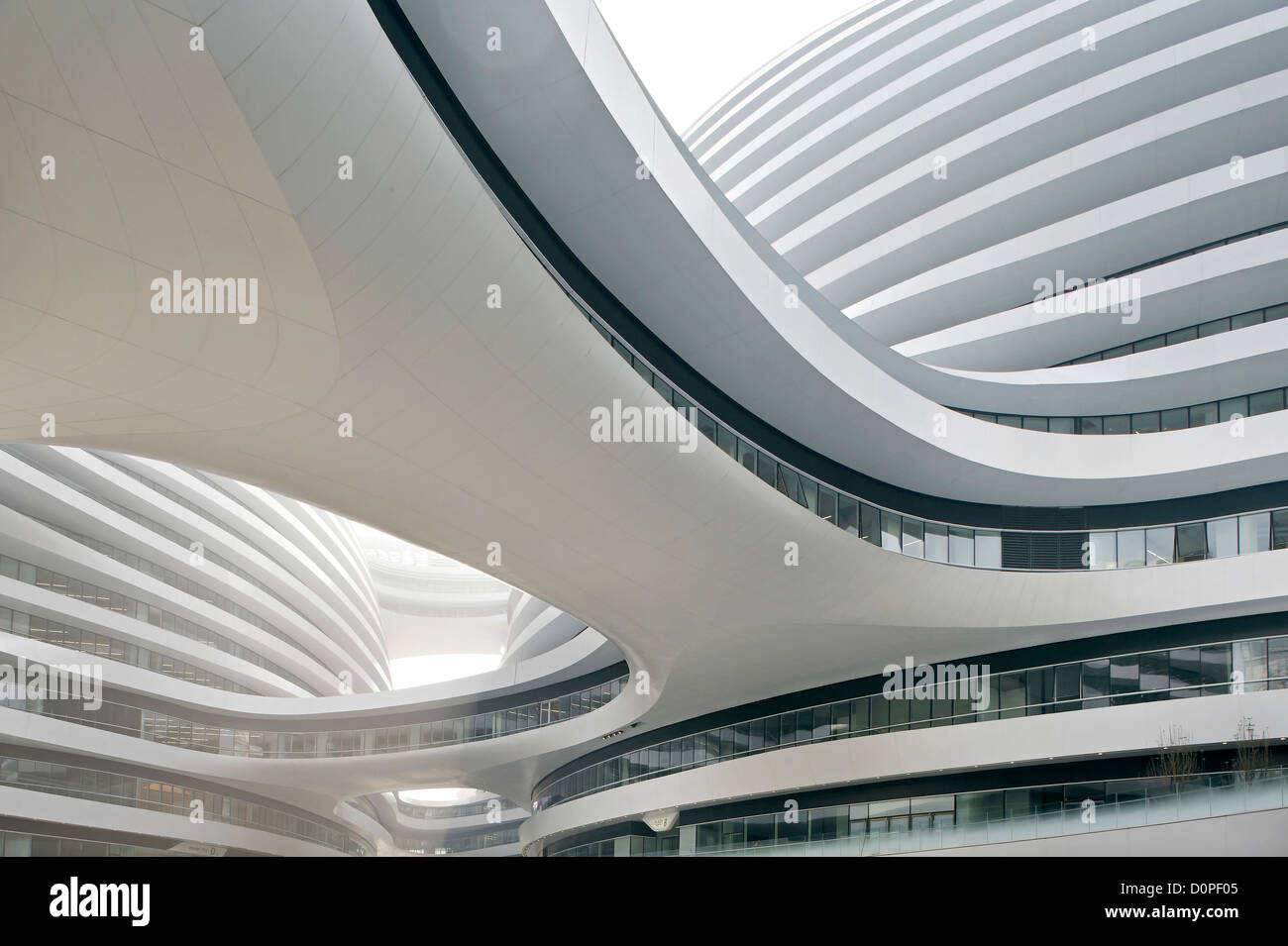 Galaxy Soho, Beijing, China. Architect: Zaha Hadid Architects, 2012. Detailed view upwards. Stock Photo