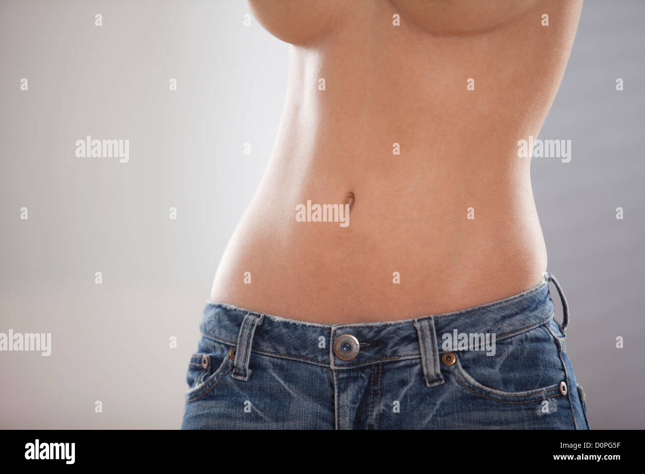 Naked female torso Stock Photo - Alamy