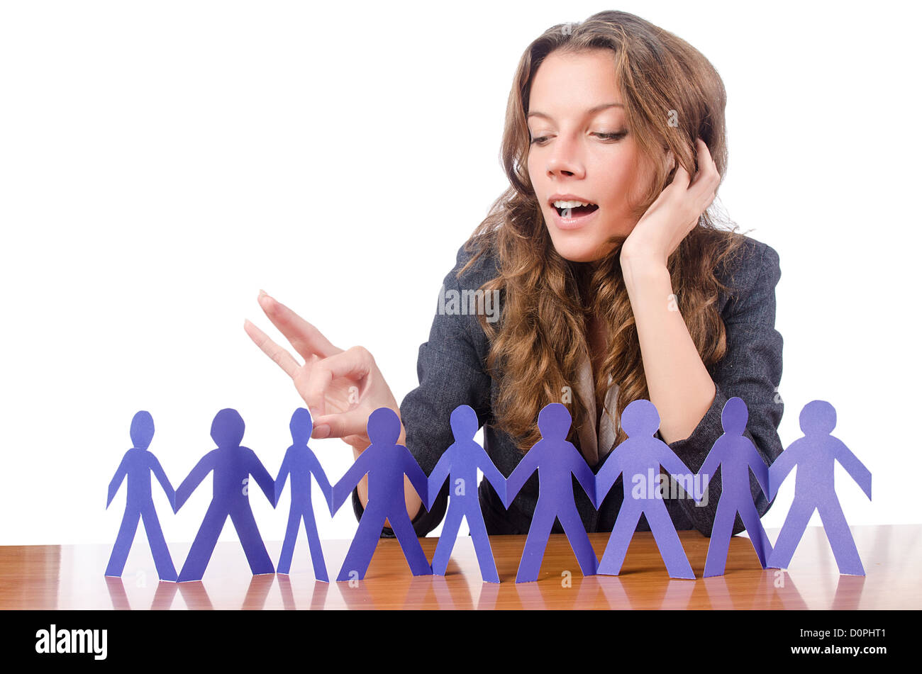 Businesswoman with paper people on white Stock Photo - Alamy