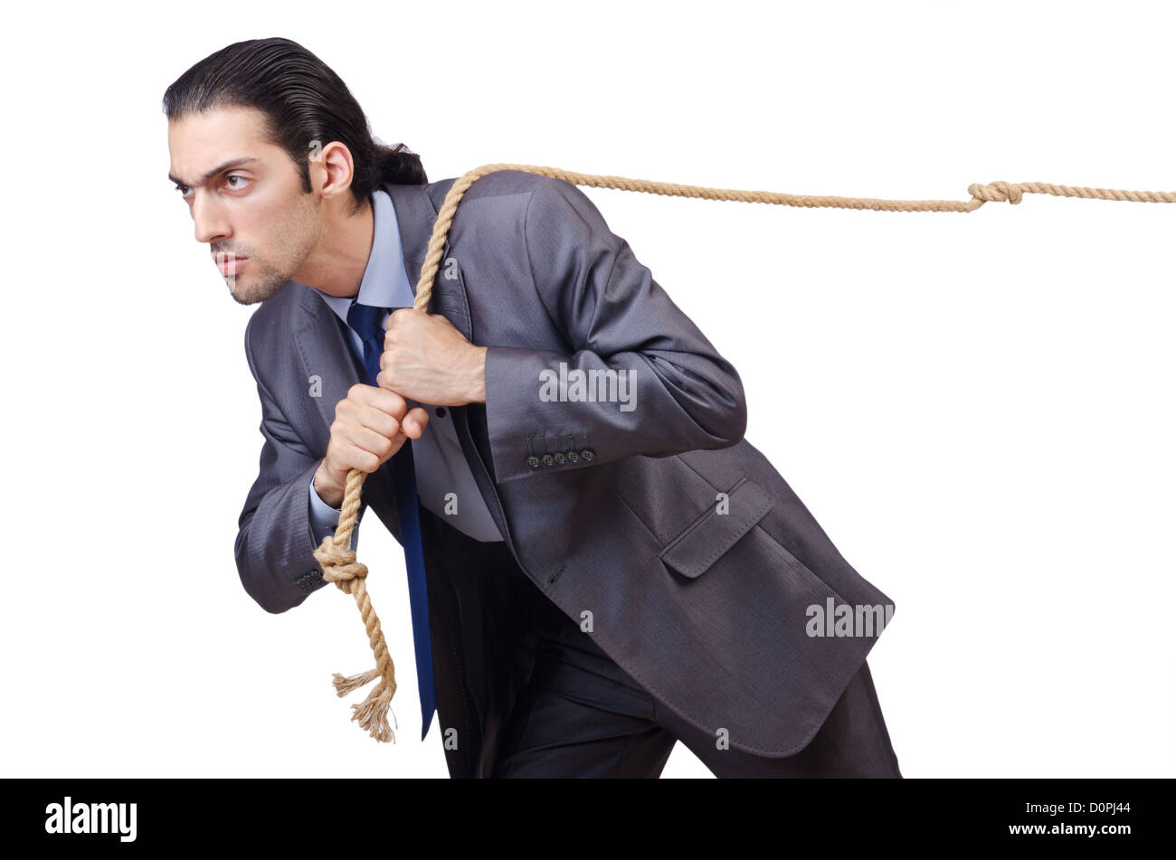 Person pulling rope Cut Out Stock Images & Pictures - Alamy