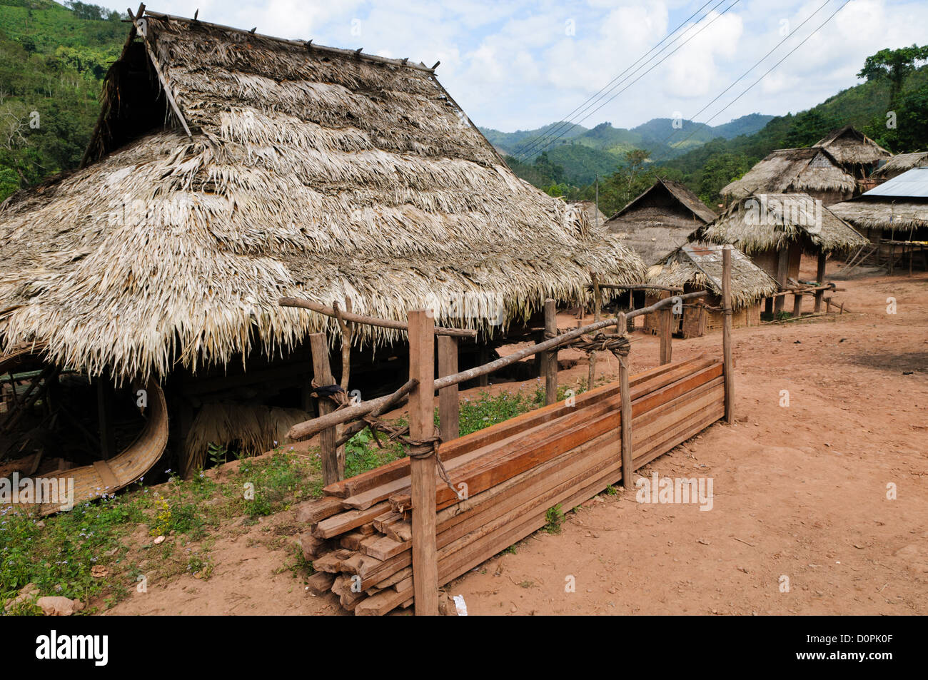 LUANG NAMTHA, Laos - The thatched roof of a building in Lakkhamma Village in Luang Namtha province in northern Laos. Lakkhamma Village was established as a joint project between the Lao government and the European Commission. Stock Photo