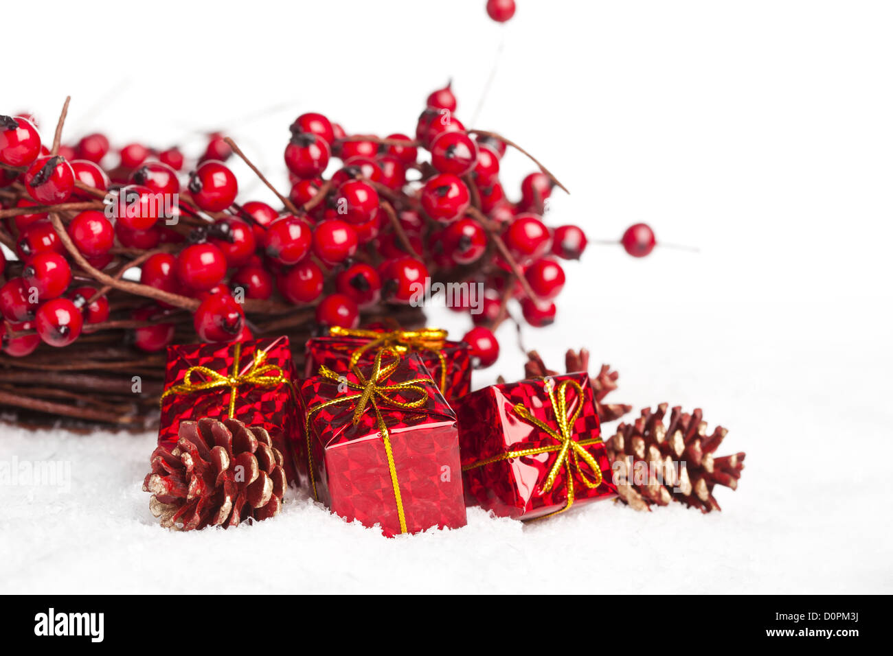 gift boxes with european holly Stock Photo Alamy