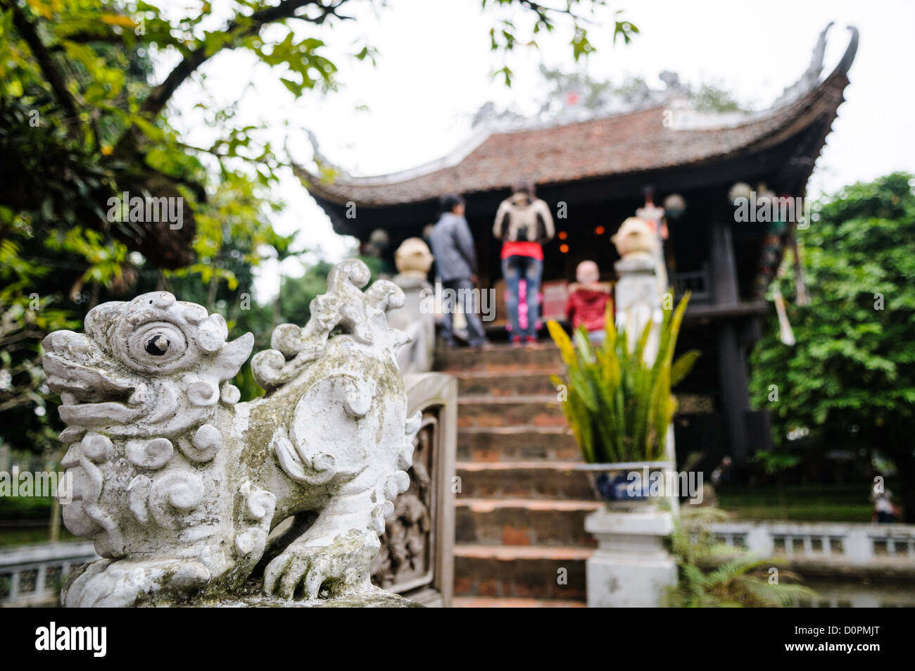 HANOI, Vietnam — The historic, small One Pillar Pagoda sits in the center of a small pond near the Ho Chi Minh Museum in the Ba Dinh district of Hanoi. It is one of the most iconic temples in Vietnam and dates back to the 11th century. Stock Photo