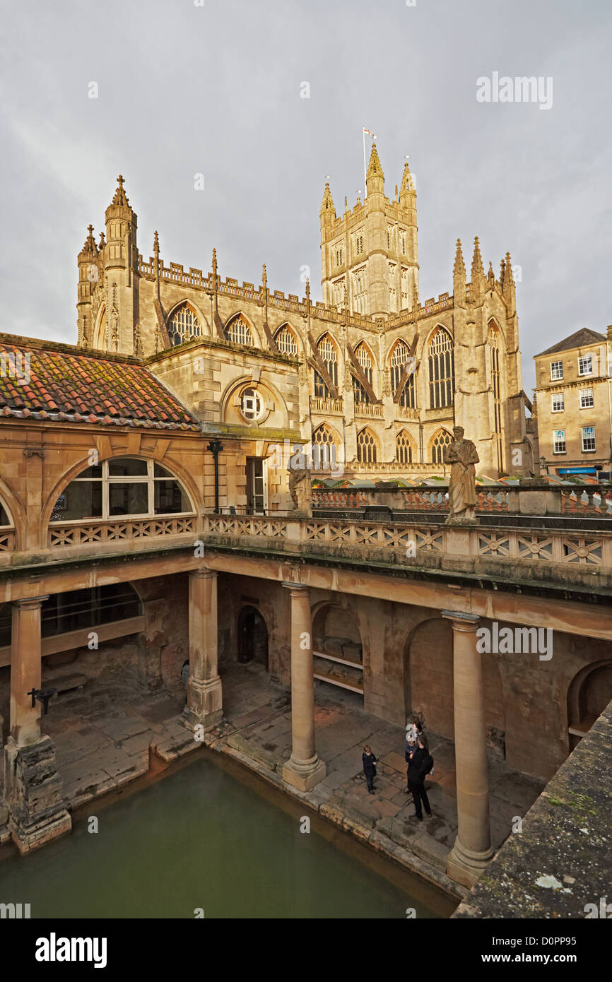 Bath Roman baths and a view of The Great Bath with Bath Abbey behind Stock Photo