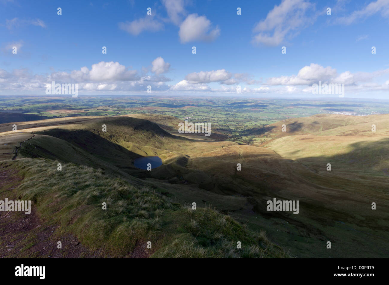 View from top of Corn Du, with Llyn Cwm Llwch and the Tarell valley, near Pen y Fan in the Brecon Beacons National Park. Stock Photo