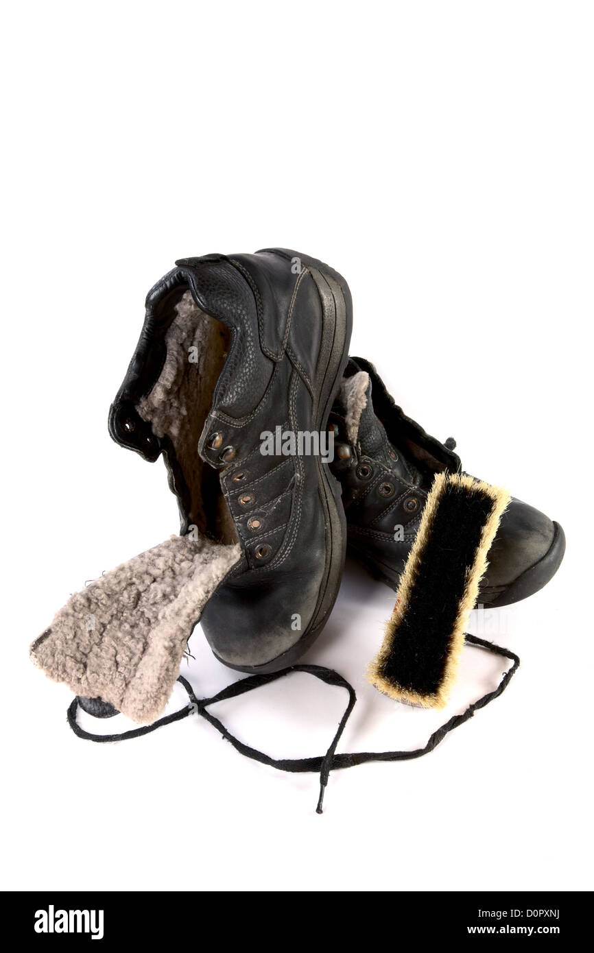 Old boot with  shoe brush Stock Photo