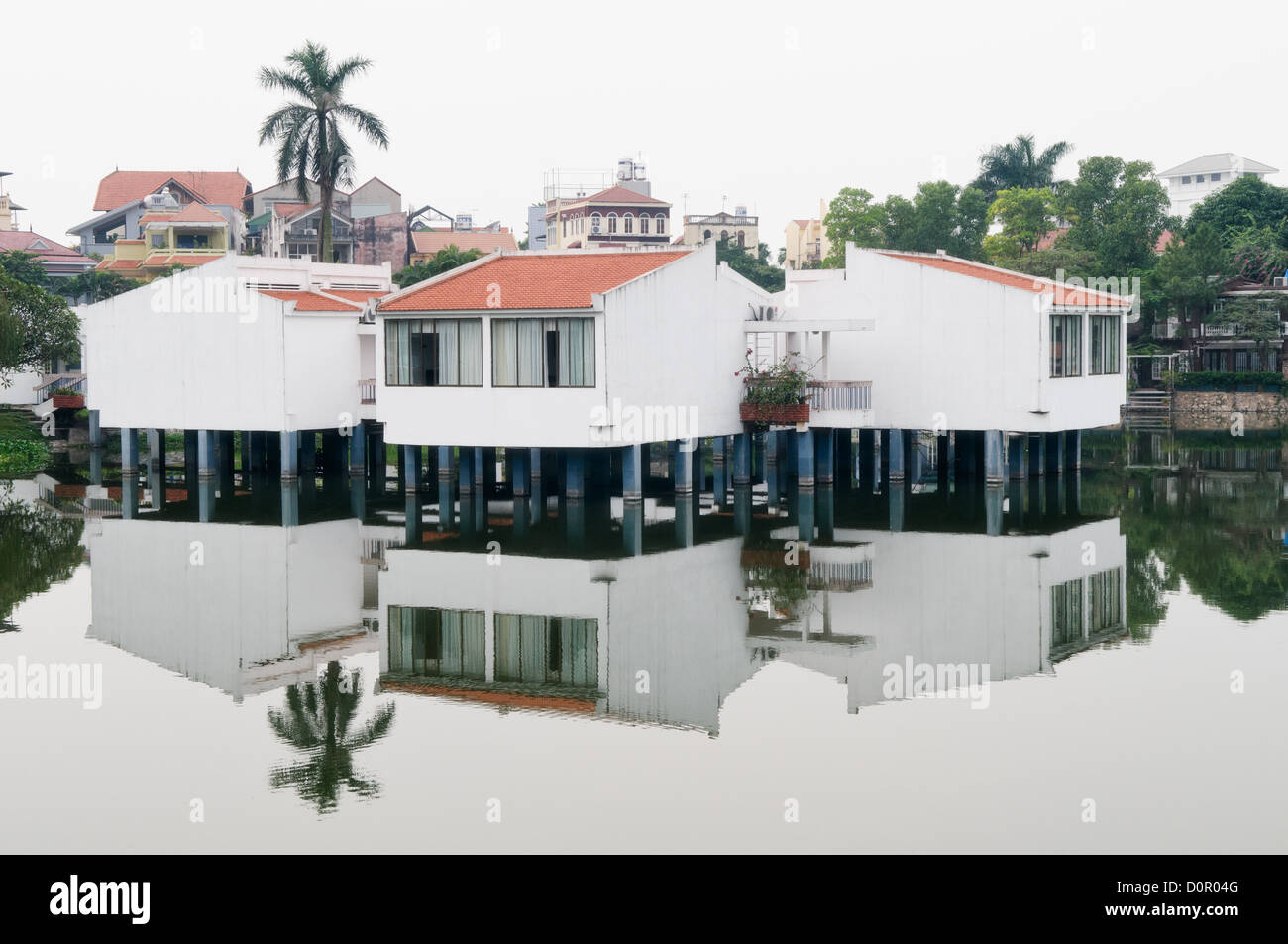 HANOI, Vietnam Houses built on stilts stand over the water of West