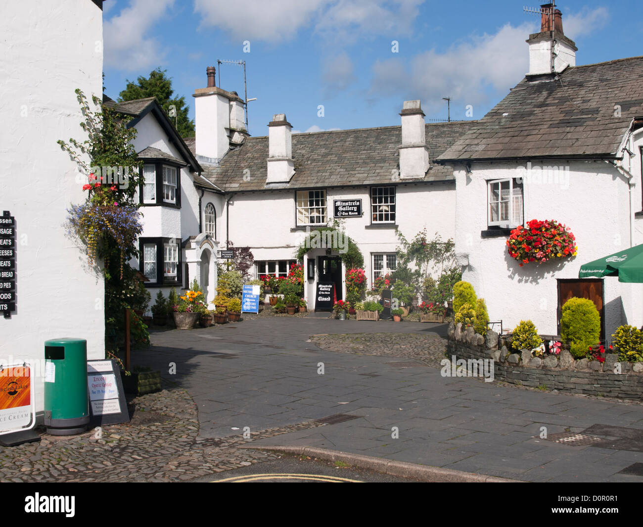 Hawkshead village in the Lake district England UK, is a natural goal for  hikers in the area Minstrels tearoom in center Stock Photo - Alamy