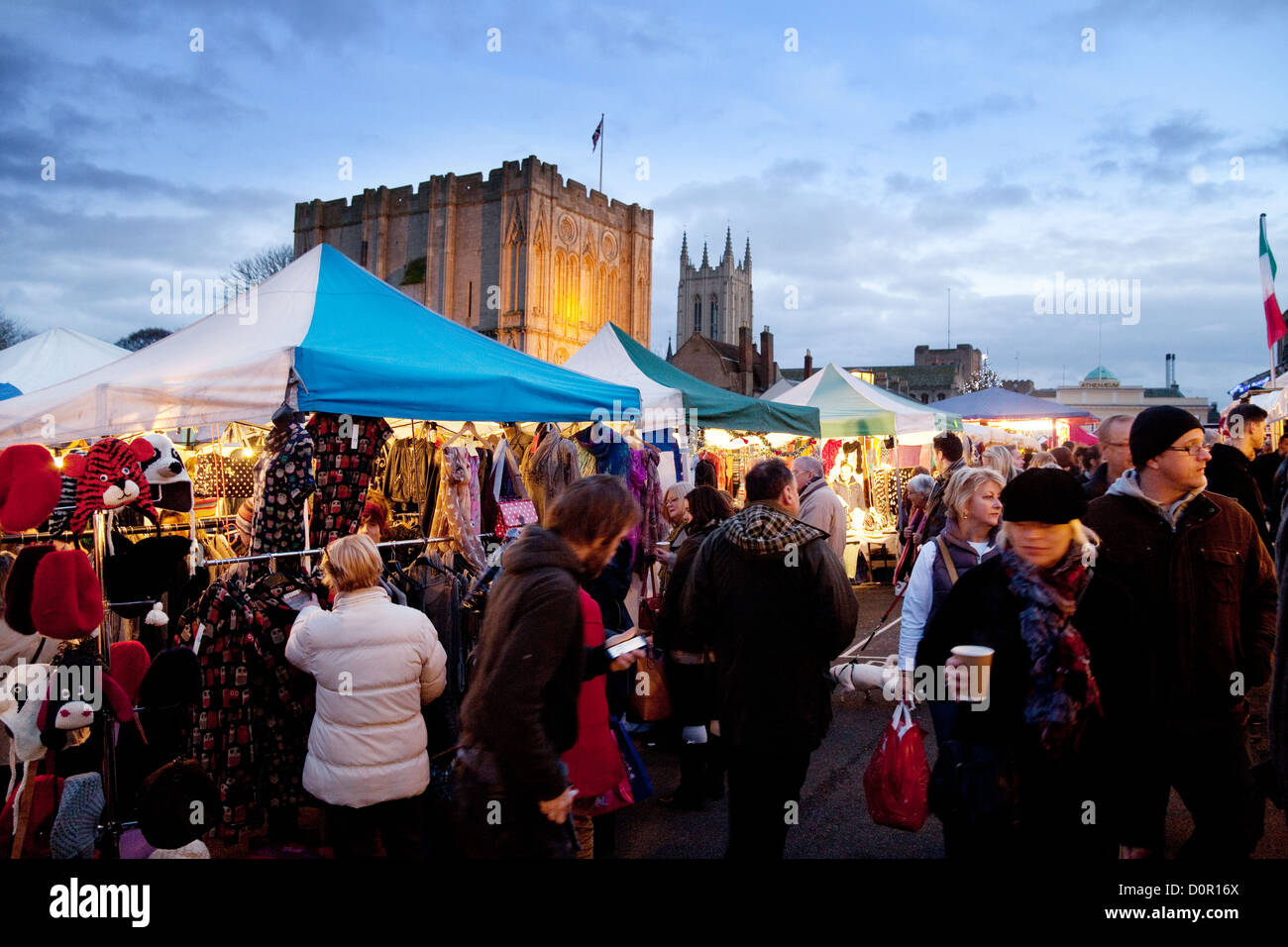 People enjoying Bury St Edmunds Christmas market, Suffolk England UK