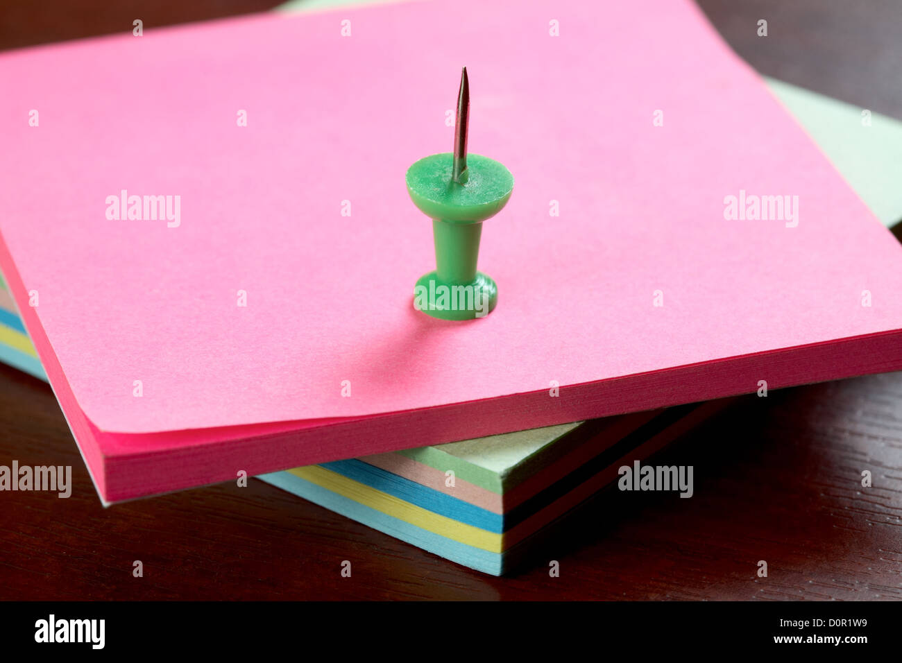 drawing pin and pile of stickers Stock Photo Alamy