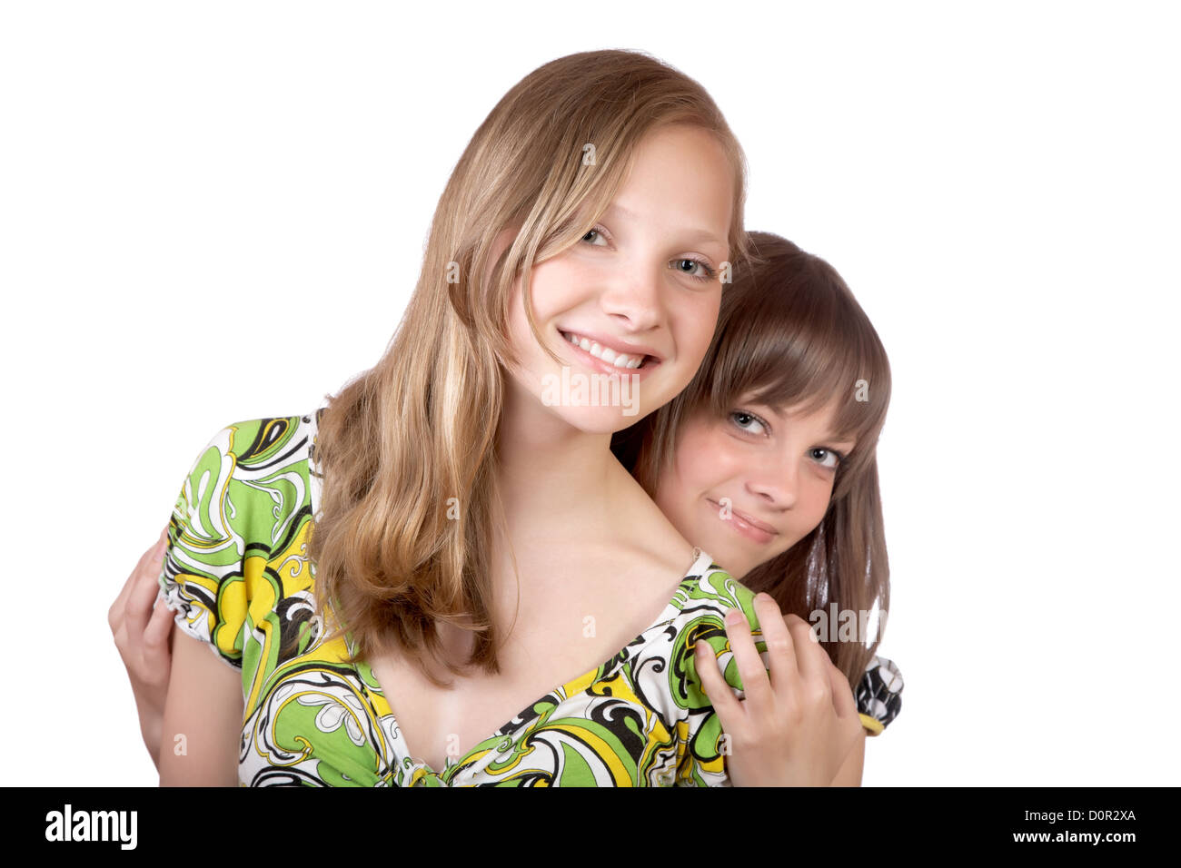 Two smiling girls isolated Stock Photo - Alamy