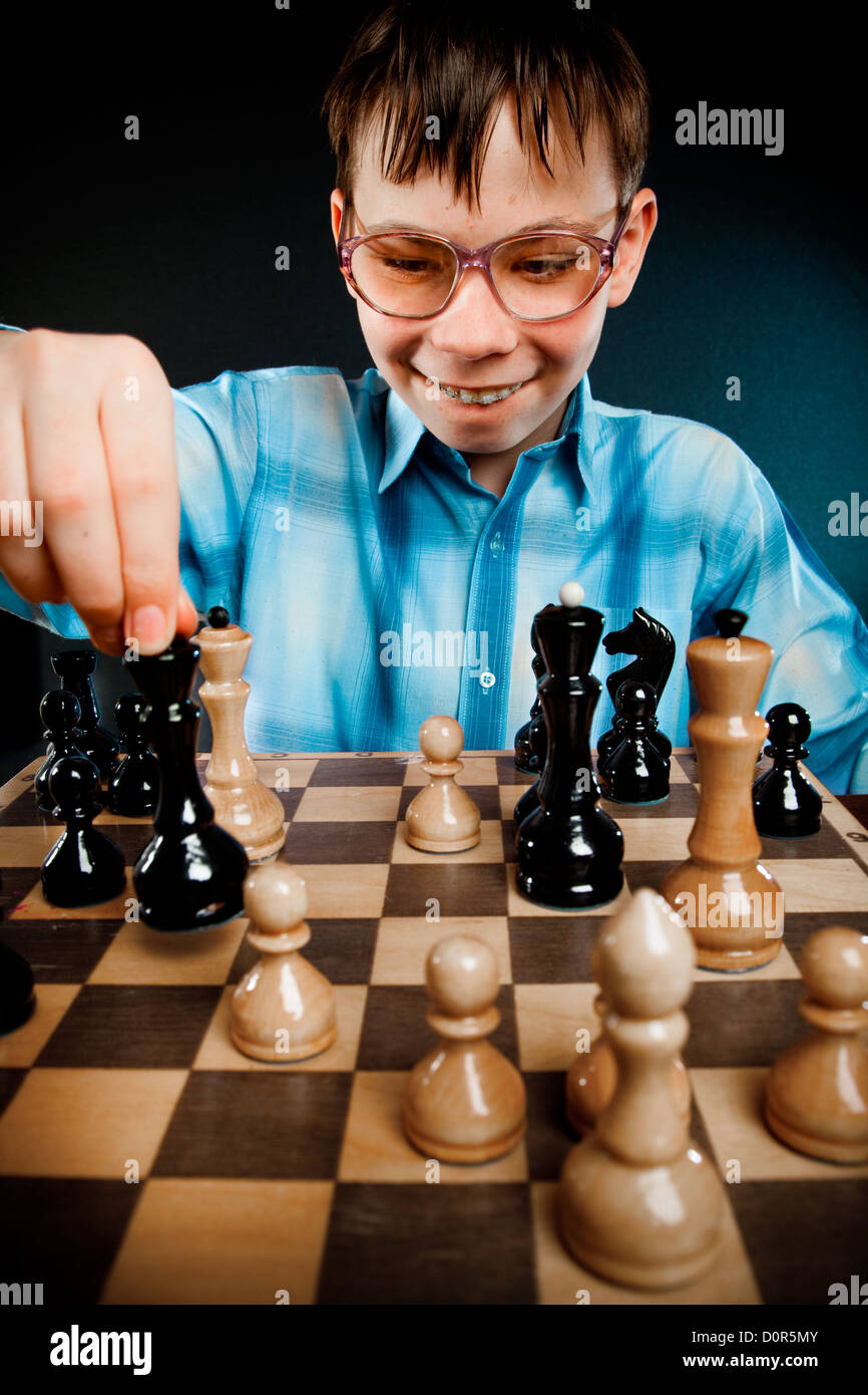 Nerd play chess Stock Photo