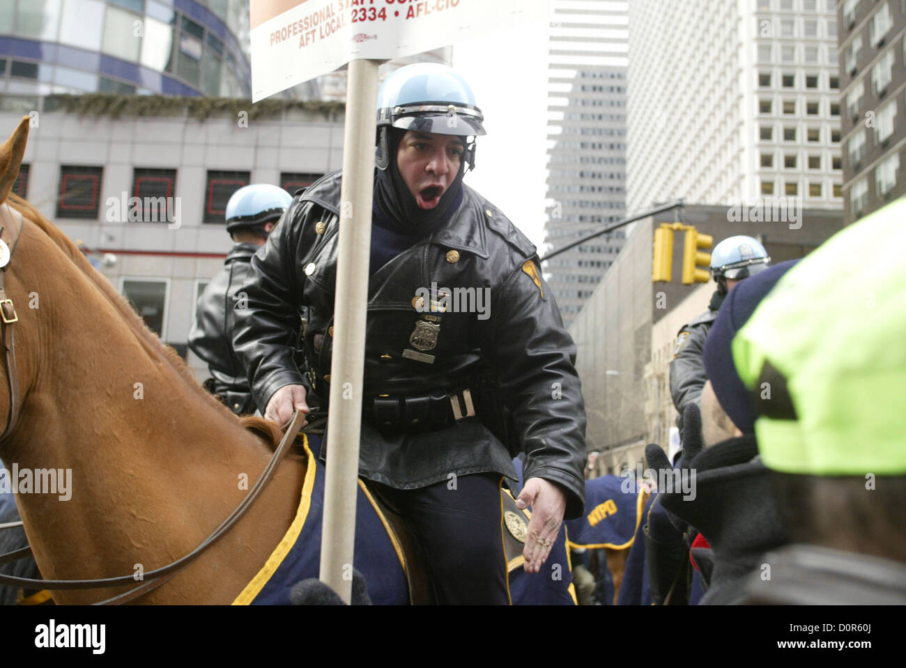 A member of the NYPD Mounted Unit yells at protesters in New York City