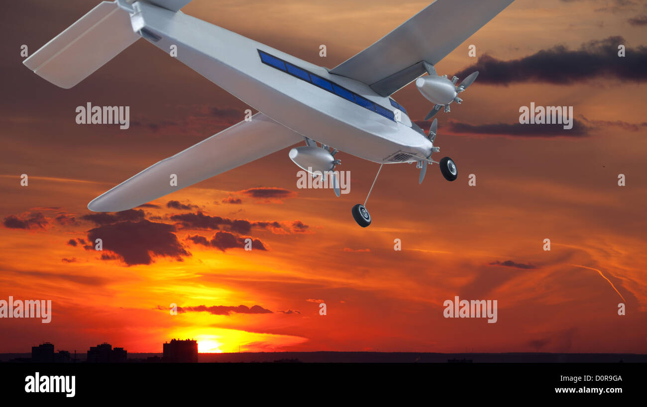 Airplane in the evening sky hi-res stock photography and images - Alamy