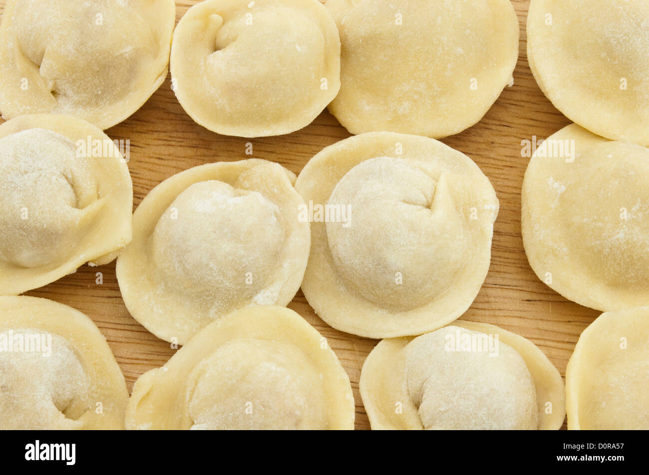 Dumplings on the board, pelmeni Stock Photo