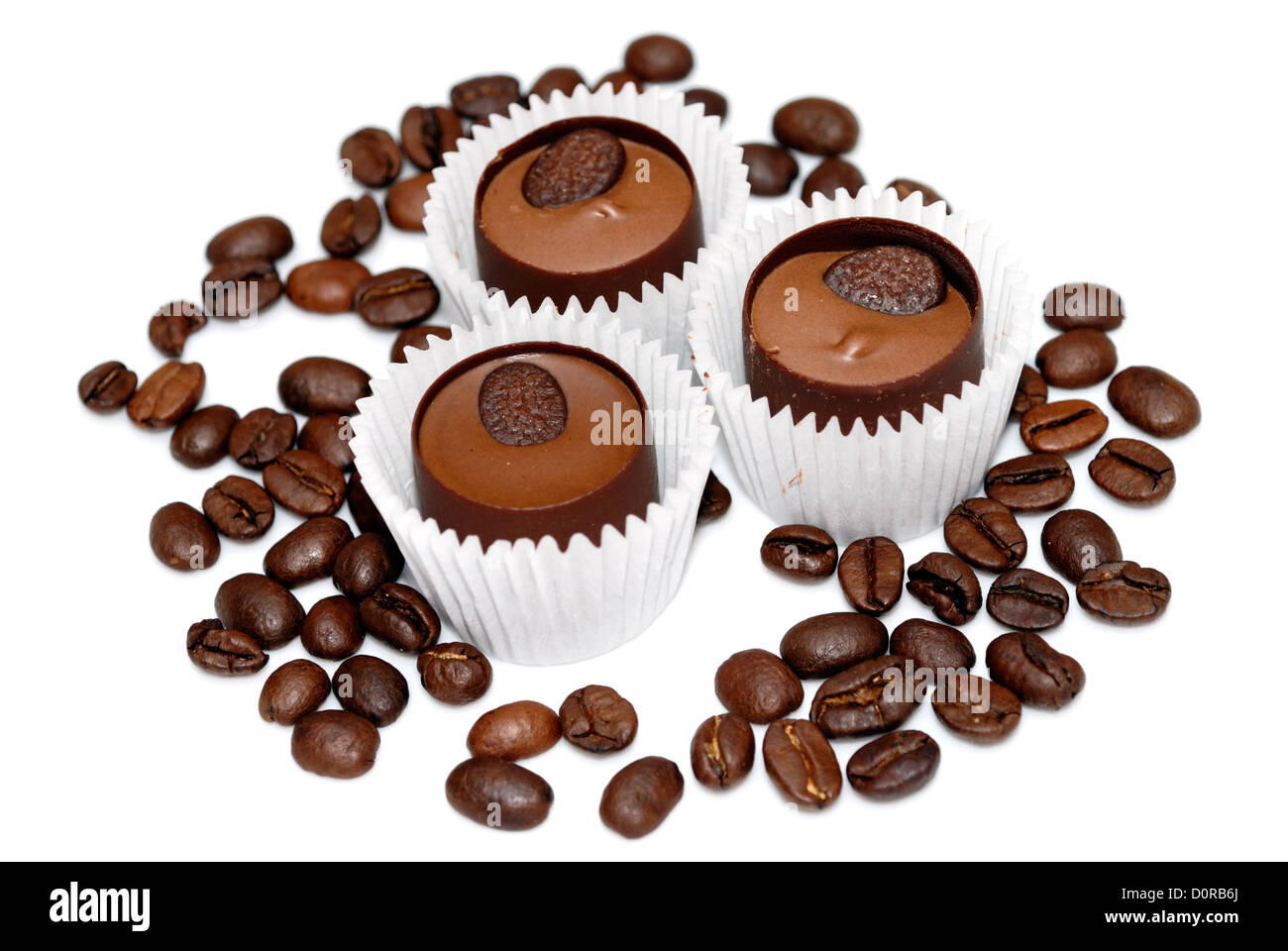 Sweet and coffee beans isolated Stock Photo