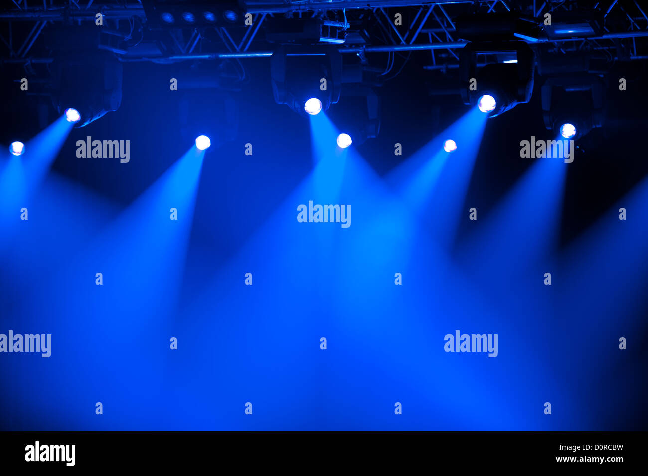 Blue stage spotlights Stock Photo