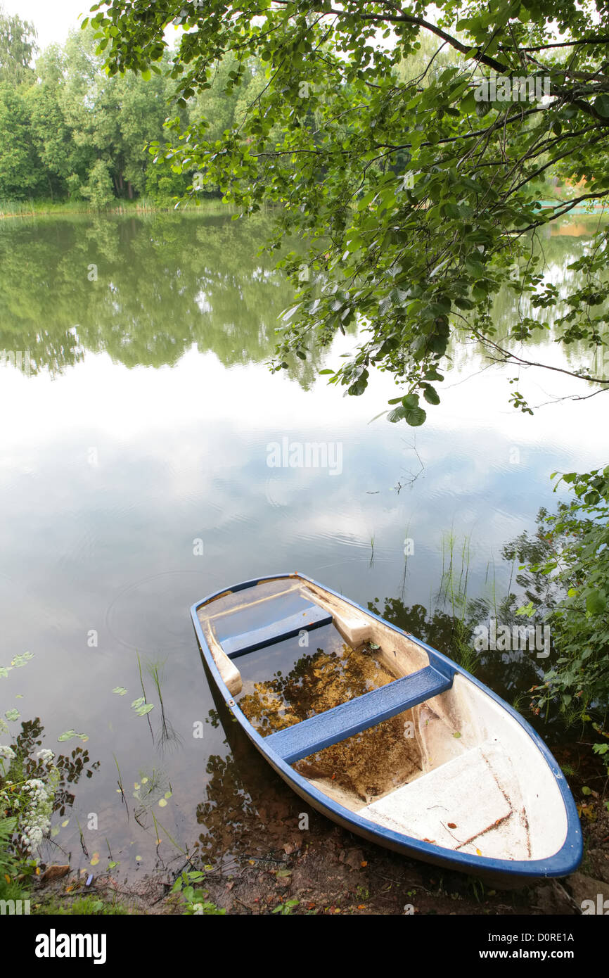 landscape with old boat Stock Photo - Alamy