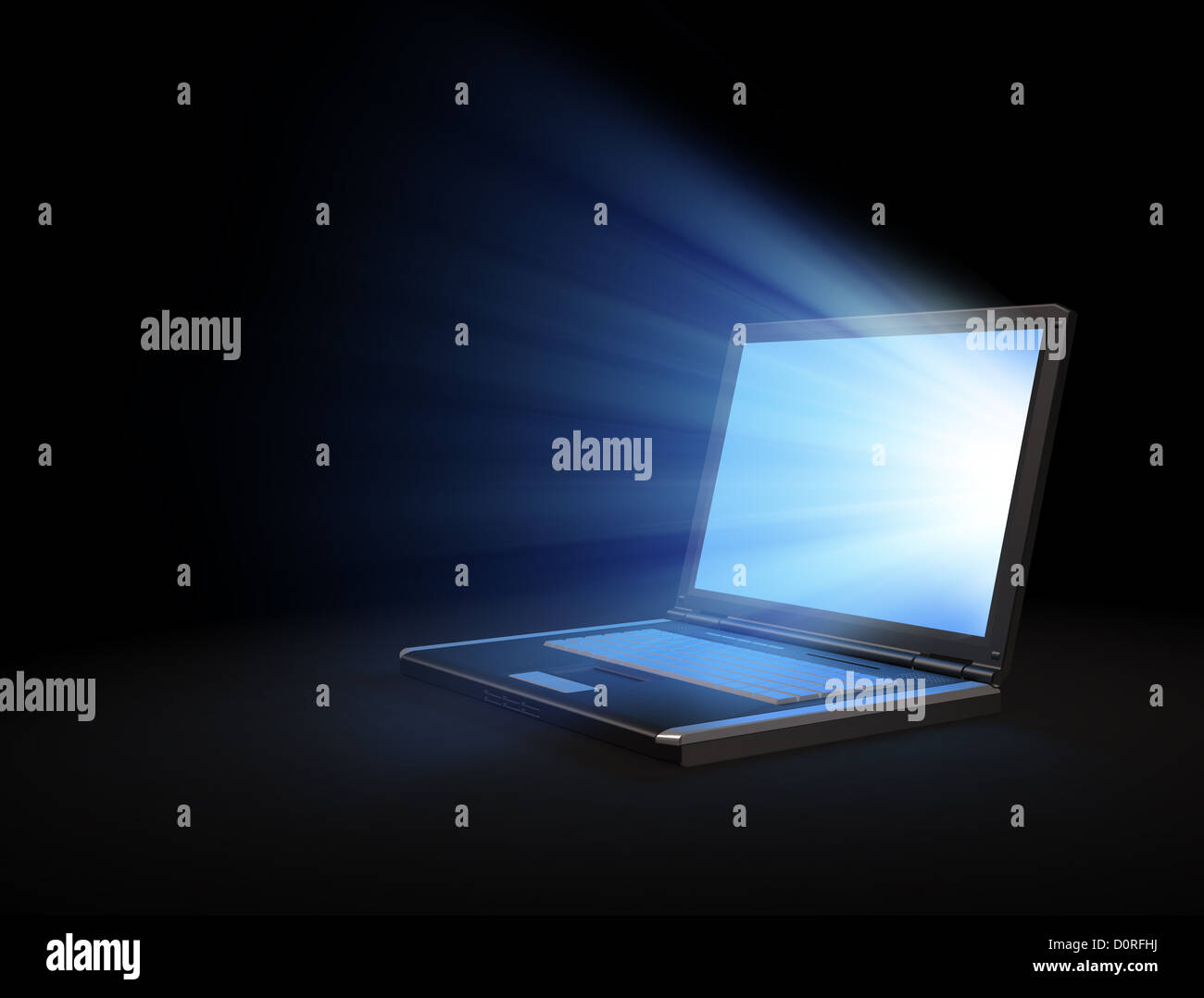 Glowing laptop screen Stock Photo