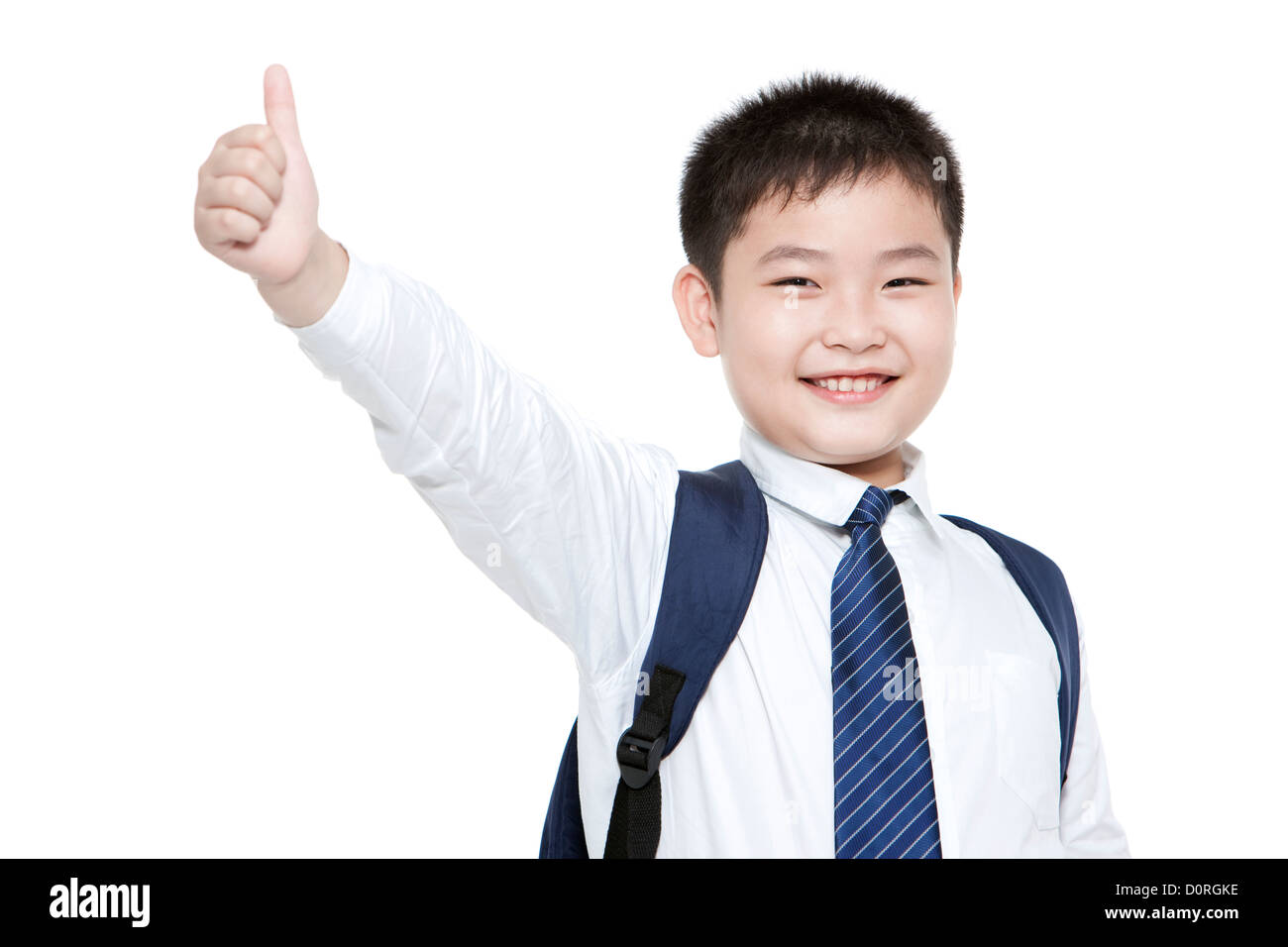 Portrait of cheerful schoolboy showing thumbs up Stock Photo - Alamy