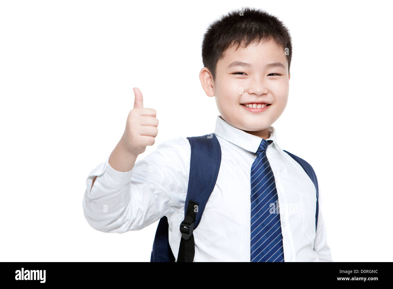 Portrait of cheerful schoolboy showing thumbs up Stock Photo - Alamy