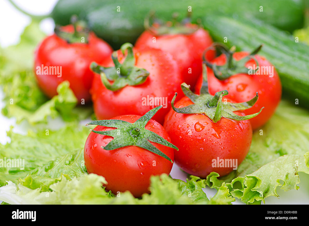 Tomatoes and cucumbers ready for salad Stock Photo - Alamy