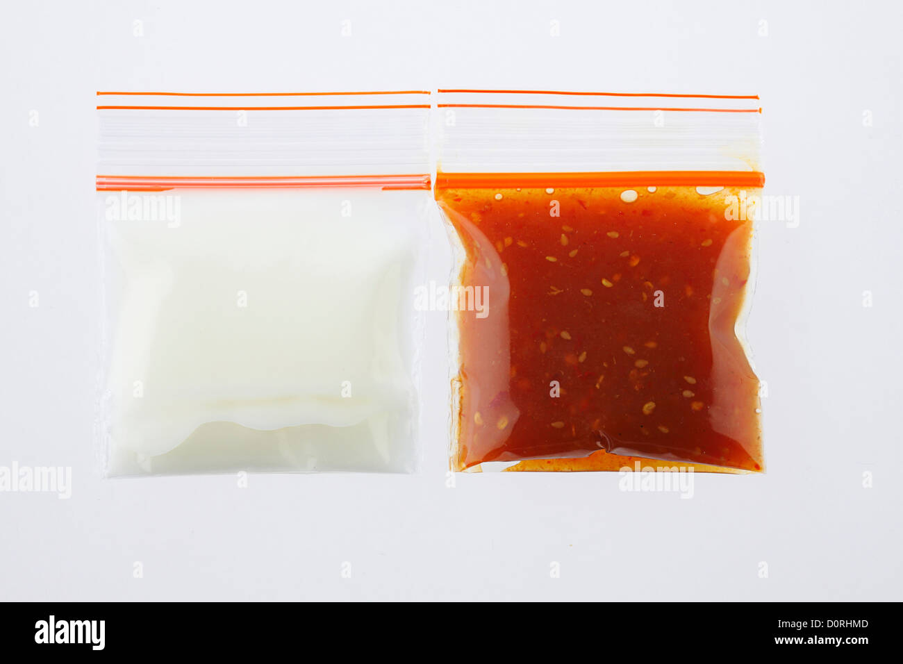 Seasoning sauces keep in the zipper bag isolated Stock Photo