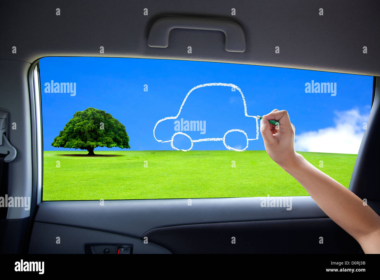 hand drawing eco green car concept on the car windows Stock Photo