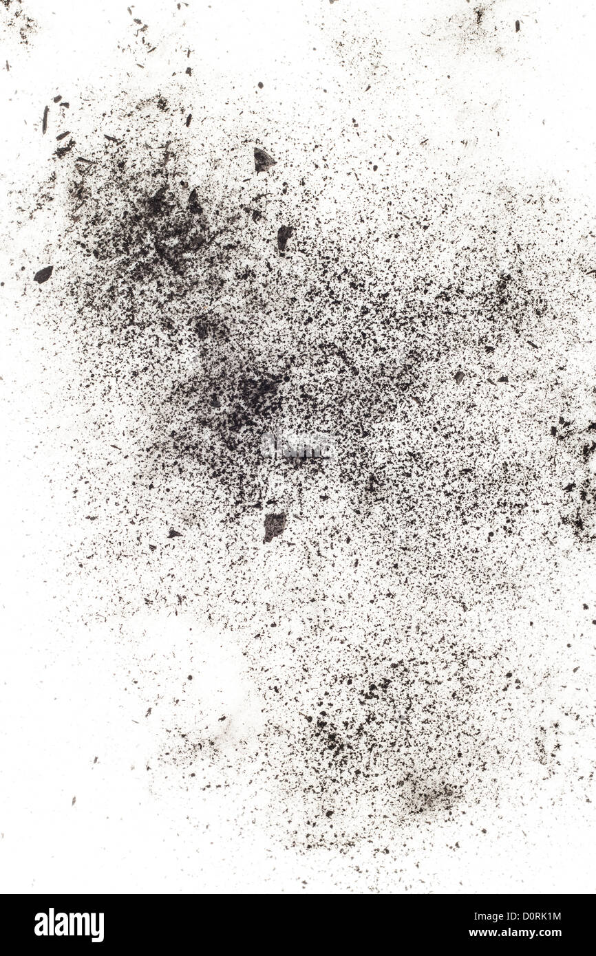 particles of charcoal on a white background. Placer cosmetics Stock Photo