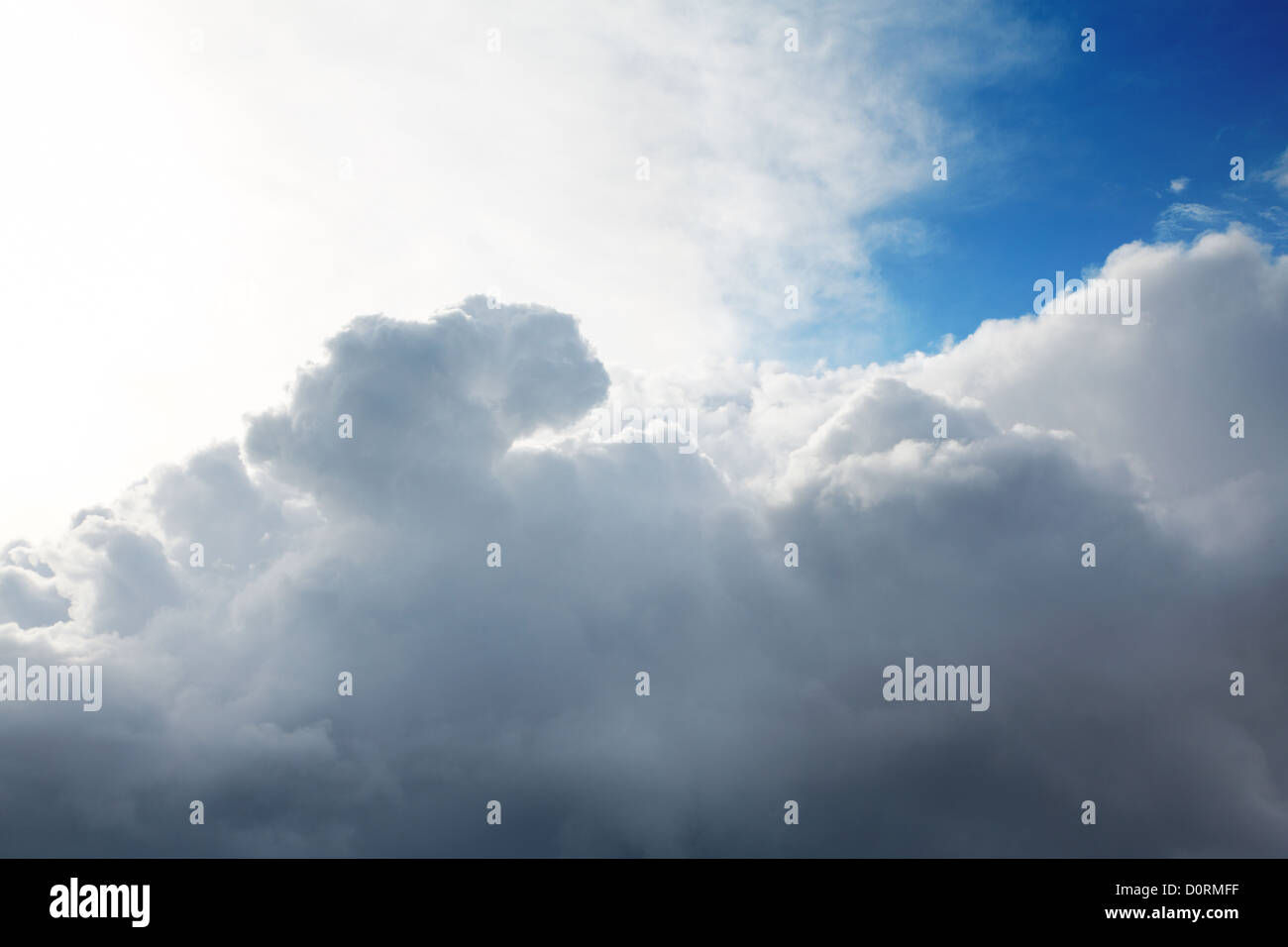 Cumulus clouds and the dark blue sky Stock Photo
