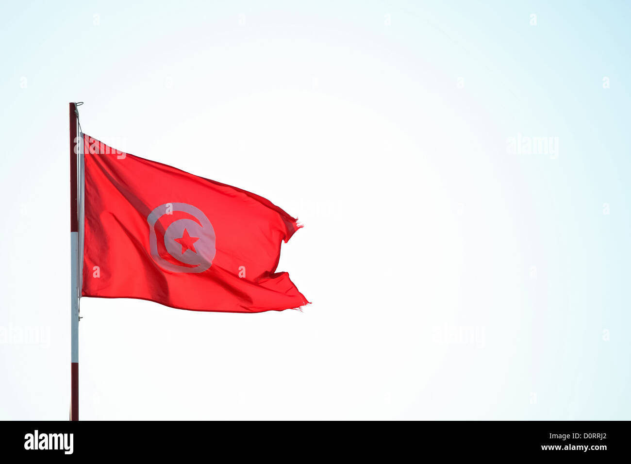 Tunisian flag waving in the wind Stock Photo