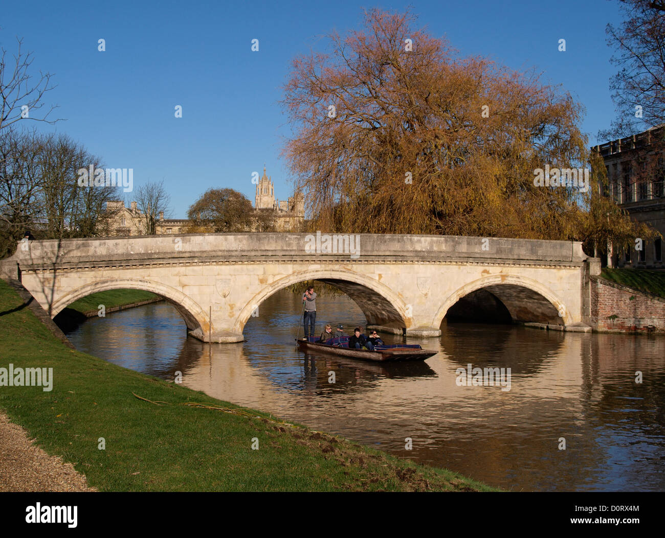 Punting along the backs, River Cam, Cambridge, UK, November 2012 Stock Photo