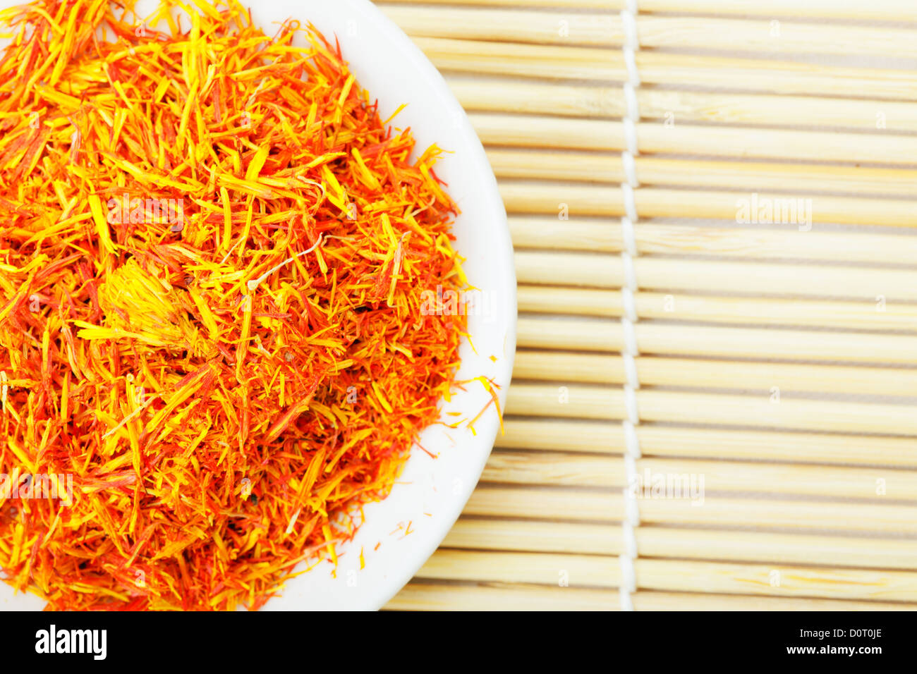 Saffron leaves spice on mat above view Stock Photo Alamy