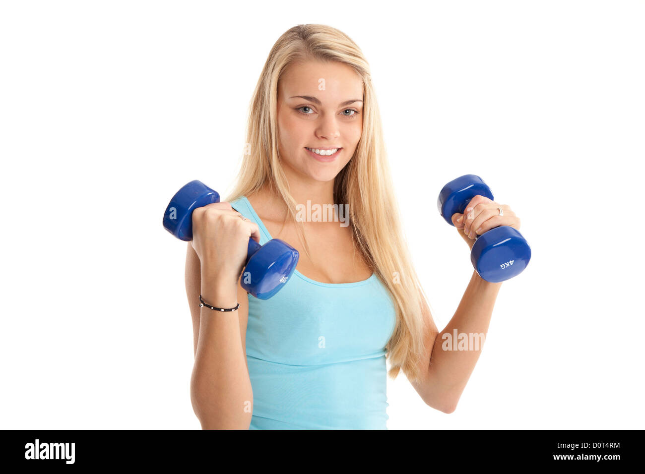Pretty young woman with dumbbells. Stock Photo