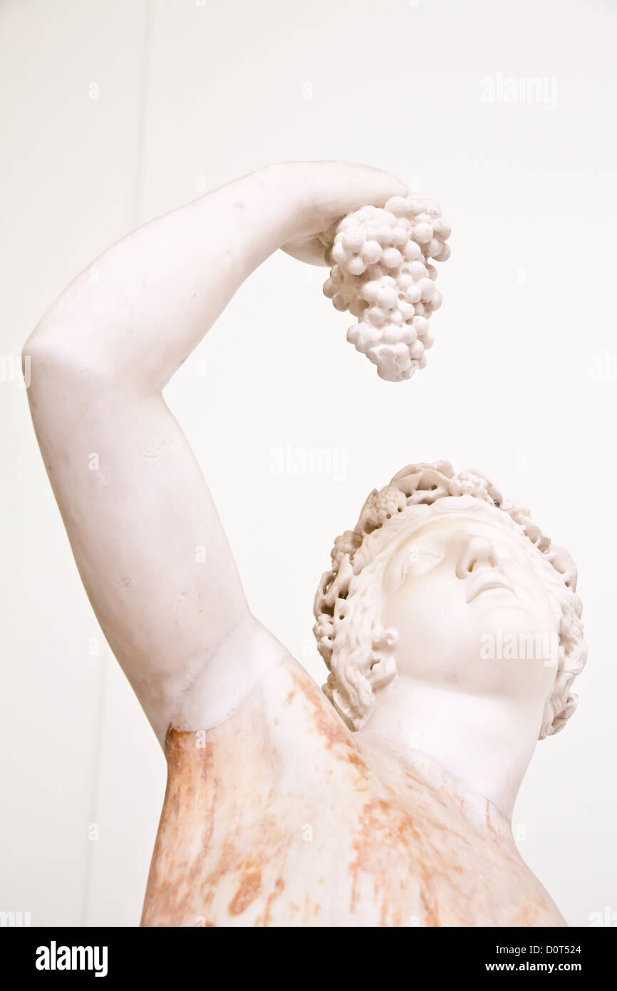 Statue with grapes Stock Photo - Alamy