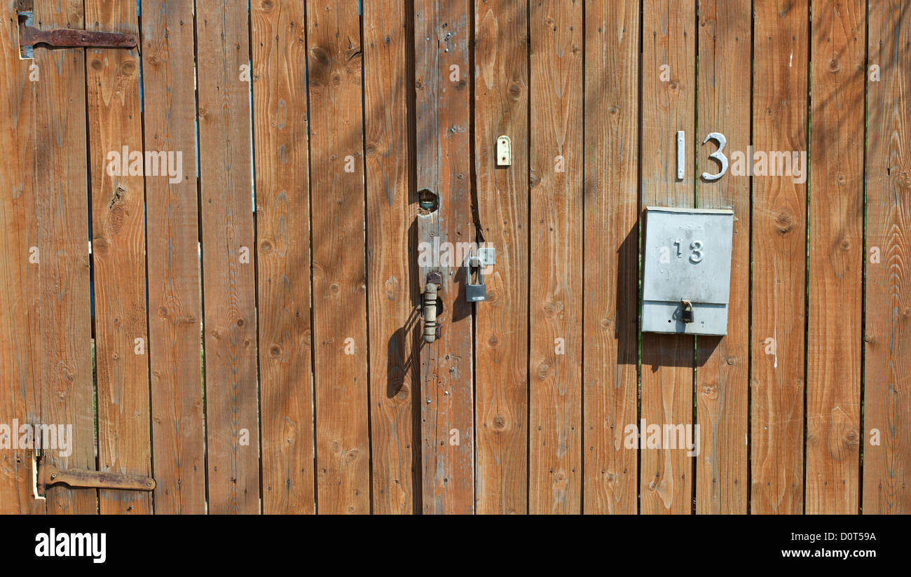 wooden fence with a mailbox Stock Photo - Alamy