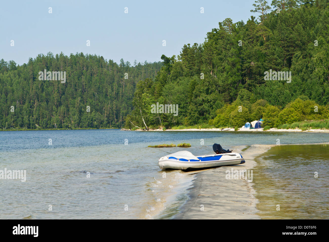 Small boat is near in bay Stock Photo - Alamy
