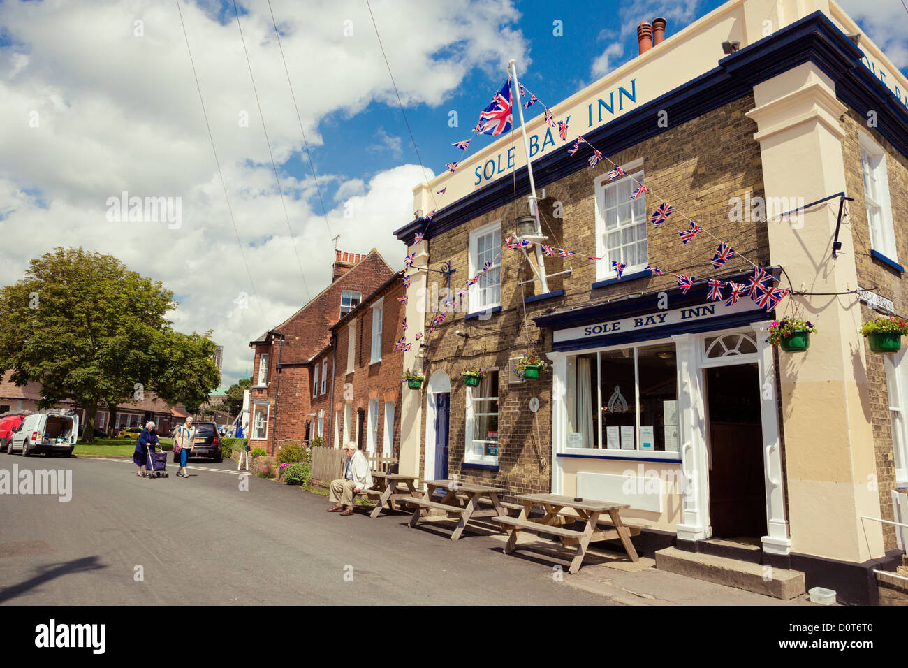 Sole Bay Inn public house and lighthouse in Southwold, Suffolk, UK