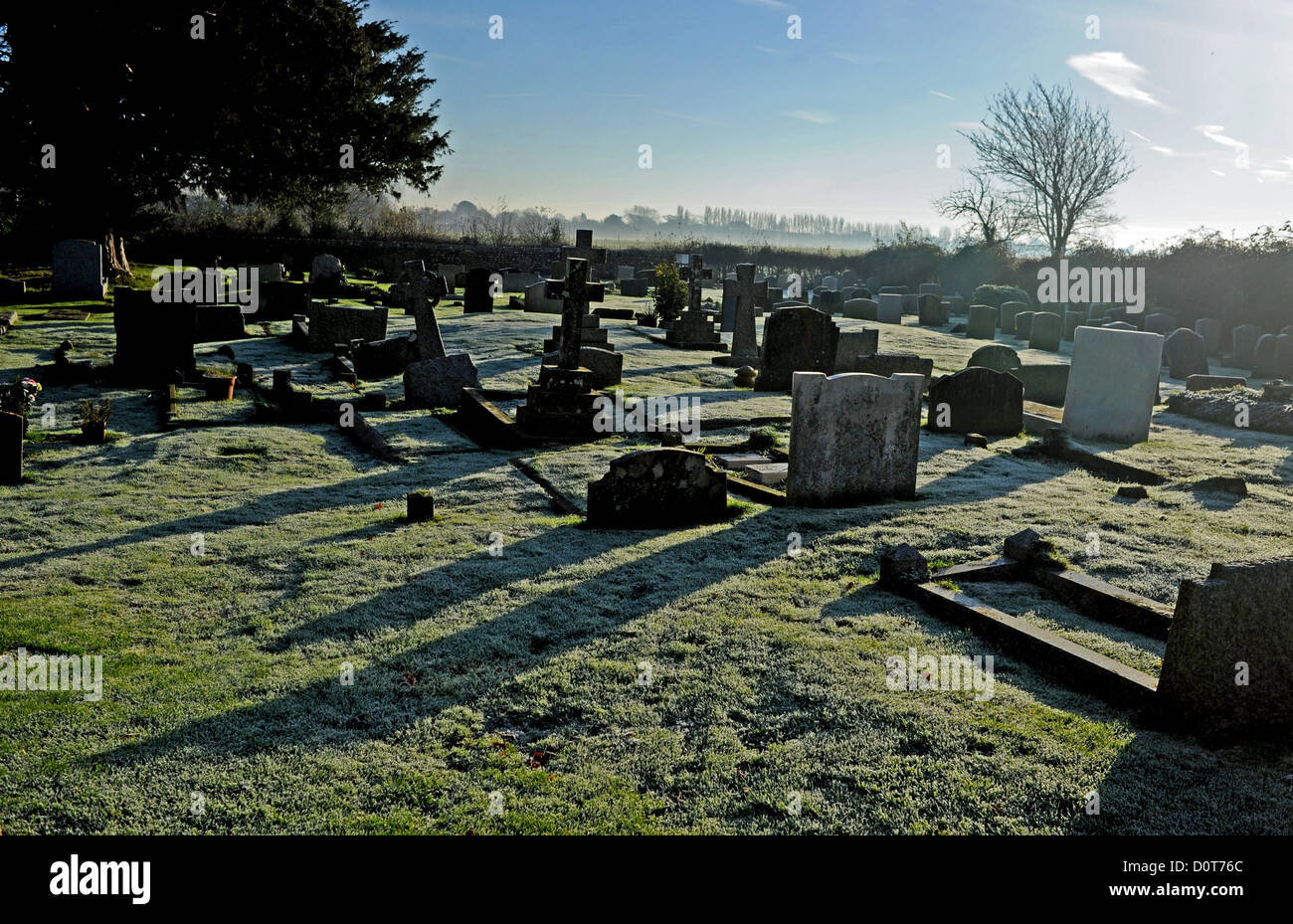 Frosty morning in St George's Church graveyard in Eastergate near Chichester West Sussex UK Stock Photo