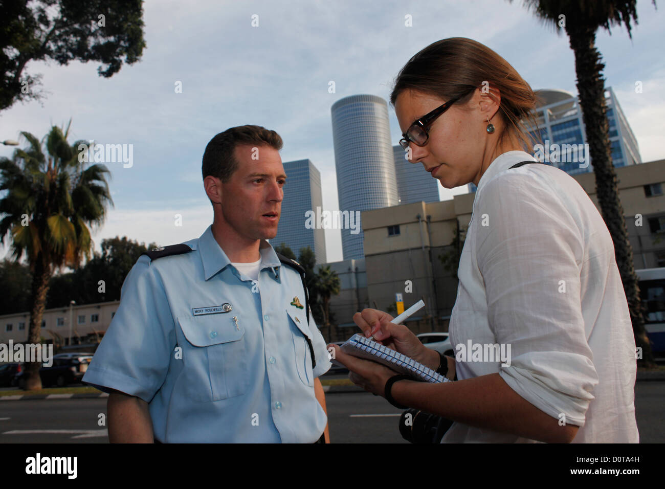 A German reporter interviews Micky Rosenfeld the Israel Police National Spokesman to the foreign Media in Tel Aviv Israel Stock Photo