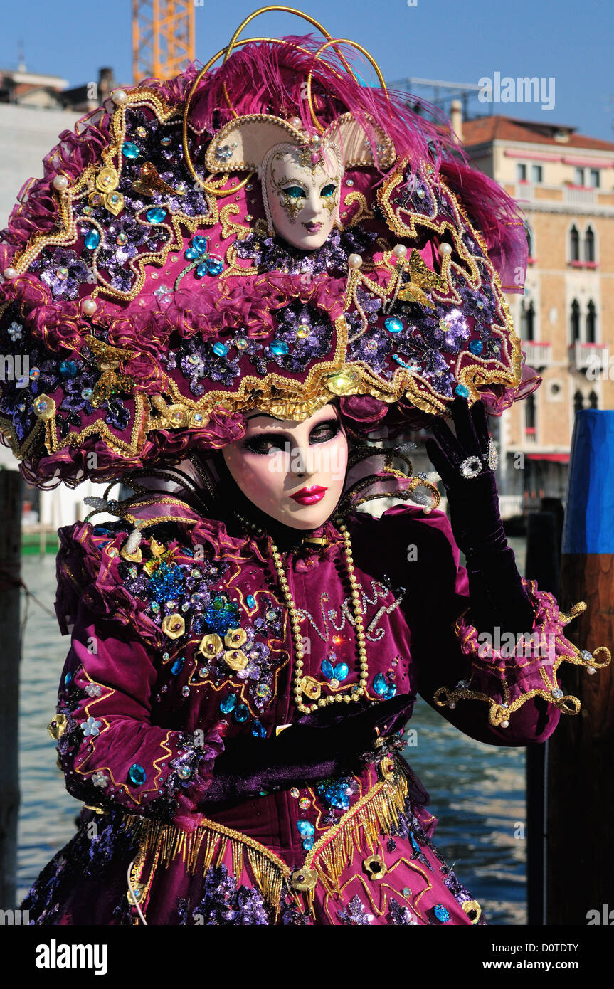 Masked participant on the island of Burano during Carnival in Venice, Italy Stock Photo