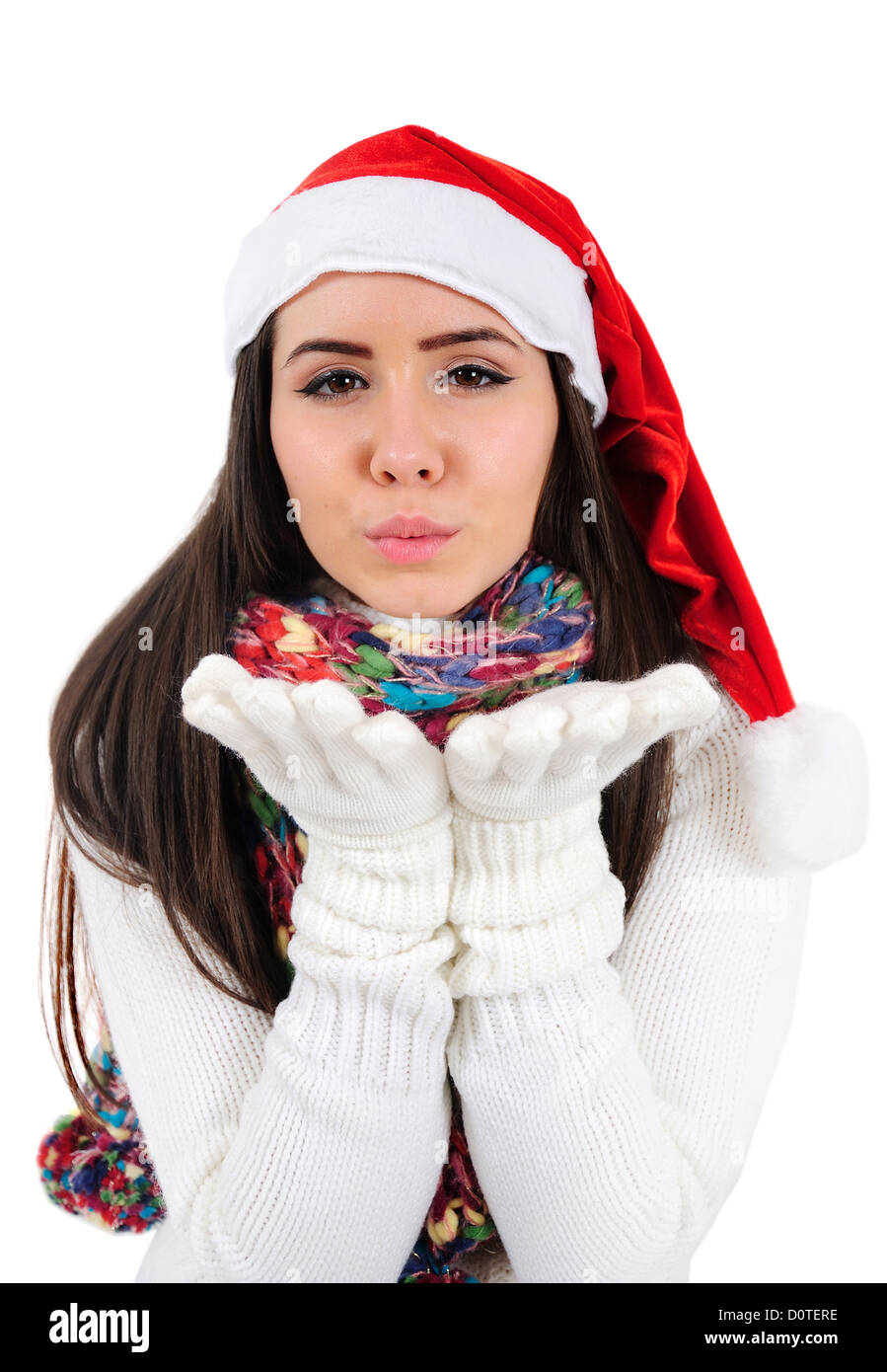 Isolated Young Christmas Girl Blowing Stock Photo - Alamy