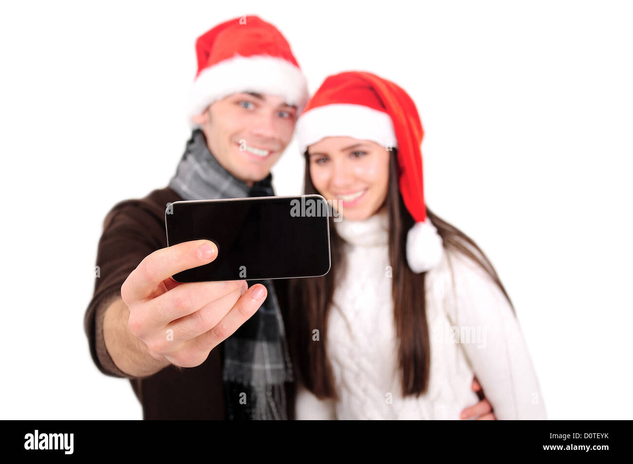 Isolated Young Christmas Couple Posing Stock Photo - Alamy