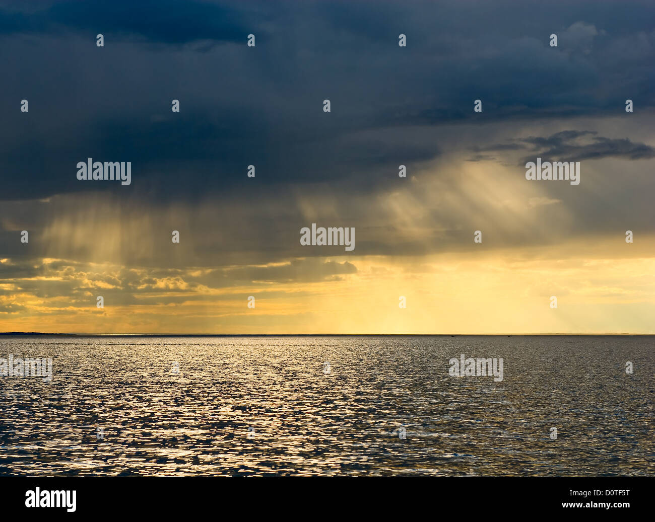 Dark moody sunset over sea hi-res stock photography and images - Alamy